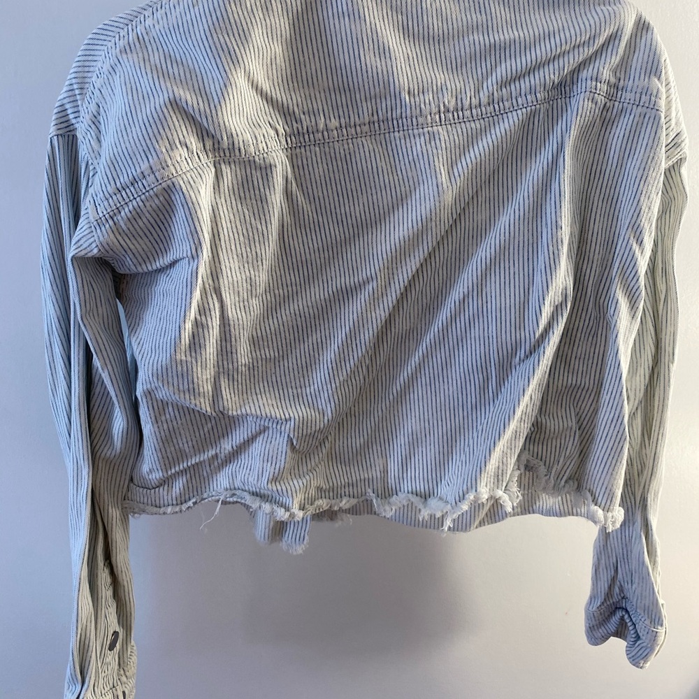 Cropped fringe denim jacket